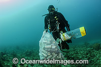 Scuba Diver with garbage Photo - Michael Patrick O'Neill